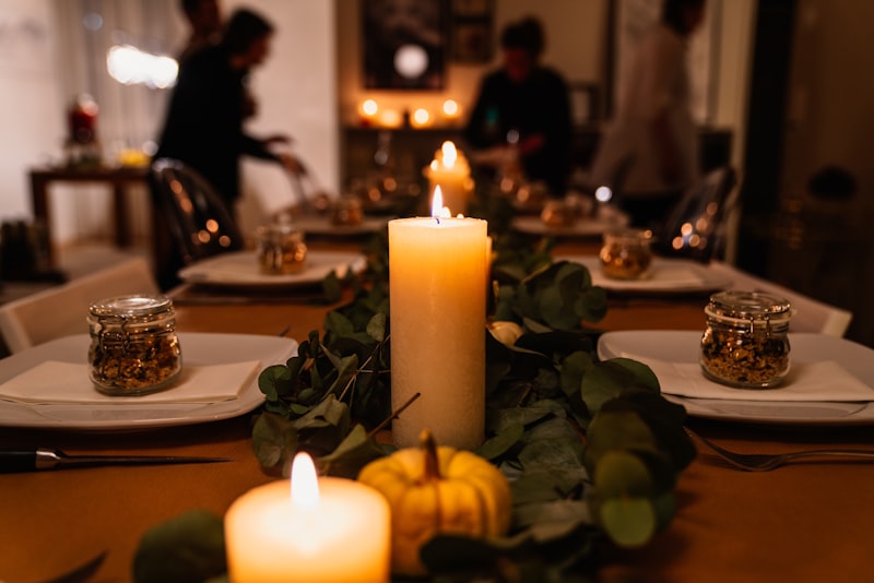 Candles and flowers on a beautifully set dinner table
